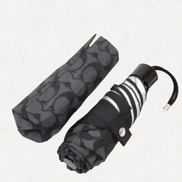 Coach UV Protection Signature Mini Umbrella, style number C4322.